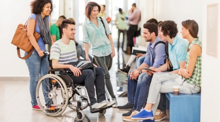 Older students, including disabled people, conversing